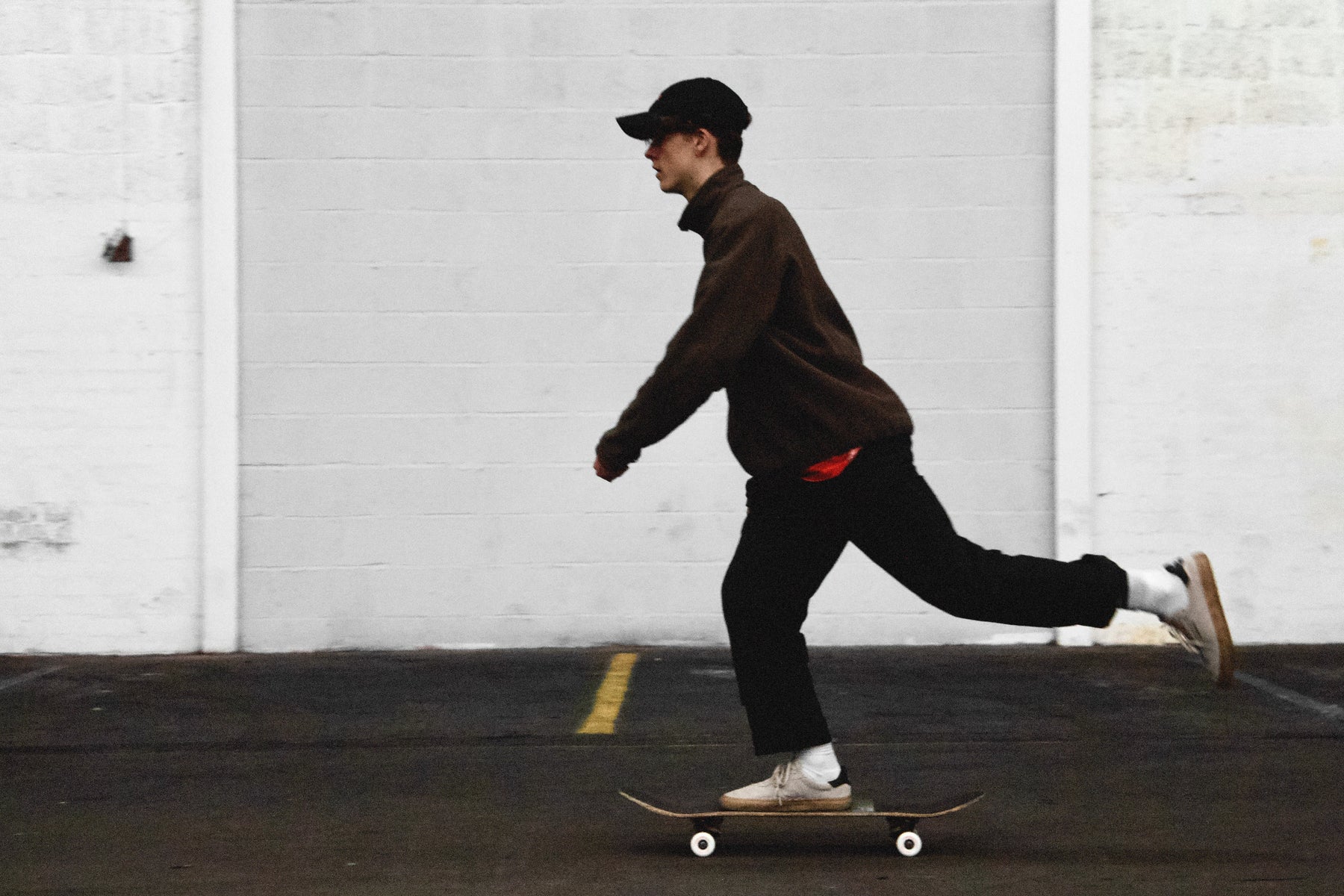 Skater riding a skateboard during an outdoor street skate session.